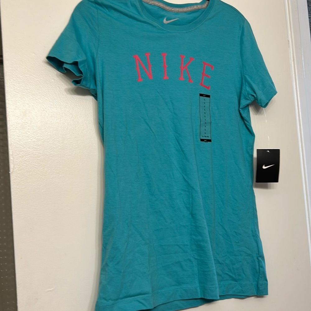 Aquamarine colored Nike t shirt size large